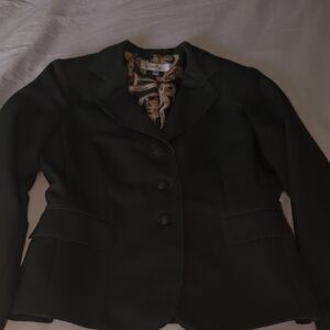 Elegant Black Blazer by [Brand]